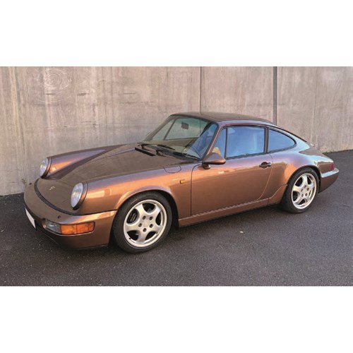 Norev Porsche 911 Carrera 2 1992 - Cognac Brown Metallic 1:18 model car