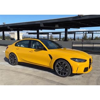 Minichamps BMW M3 2024 - Yellow 1:18 model car