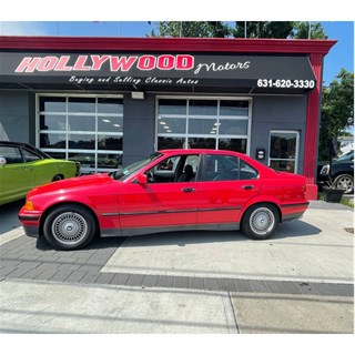 Minichamps BMW 3 Series (E36) Limousine 1993 - Red 1:18 model car